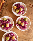 Gemüsebällchen auf Radicchio Senf Salat